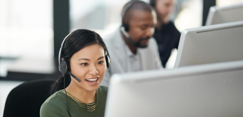 Female call centre worker smiling