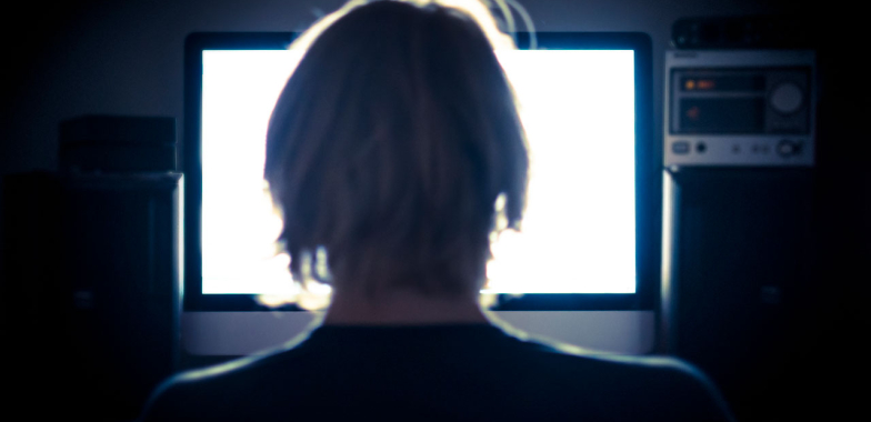 User in front of computer screen