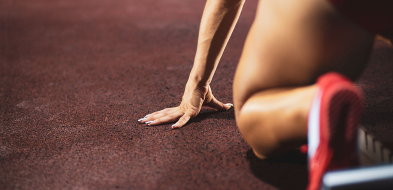 Runner at starting blocks