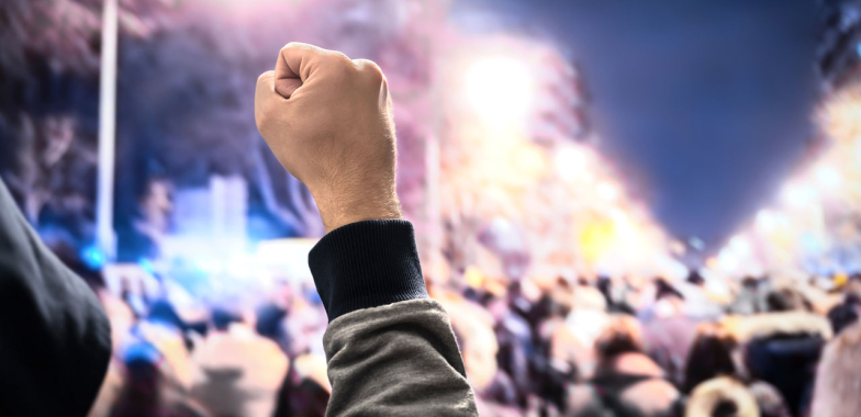 Protest man with fist raised