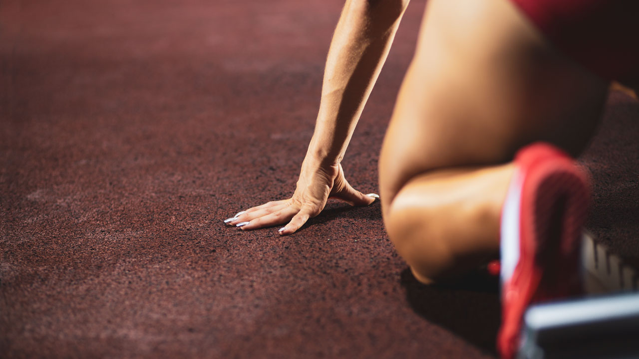 Runner at starting blocks